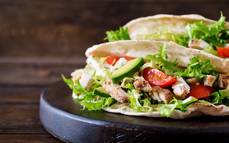 Is shawarma Greek or Mediterranean traditional shawarma wrap with chicken garlic sauce and vegetables