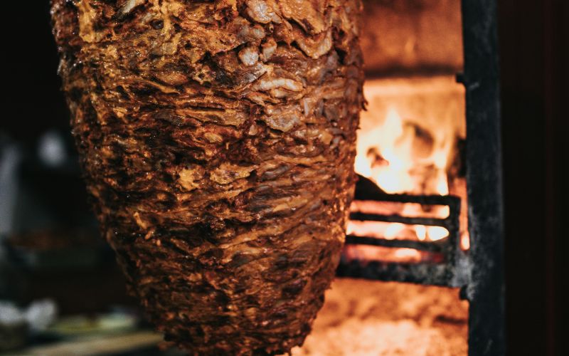 what does shawarma taste like chicken shawarma cooking on rotisserie