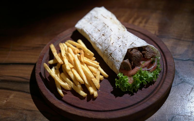 Grilled chicken shawarma cooked on BBQ grill