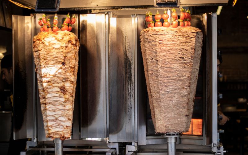 how shawarma is made marinated meat cooking process