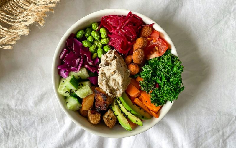 Homemade shawarma bowl recipe with rice, hummus, vegetables and garlic sauce
