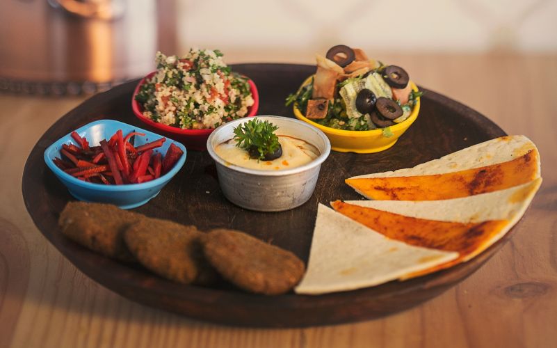 Authentic shawarma platter recipe with rice hummus pita bread and garlic sauce