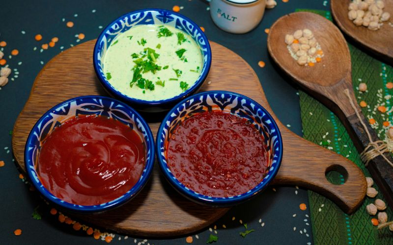 Ingredients for homemade shawarma sauce recipe including garlic yogurt and lemon