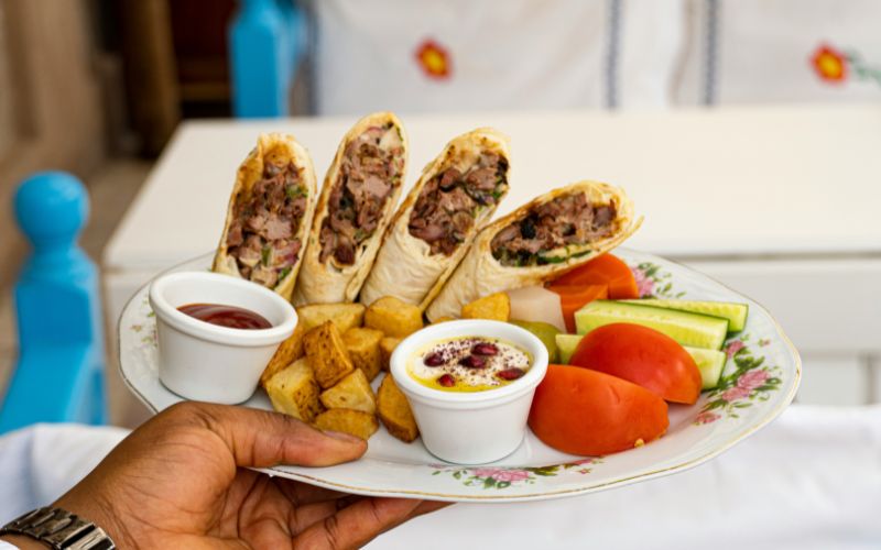 Different types of authentic shawarma sauces including toum and tahini